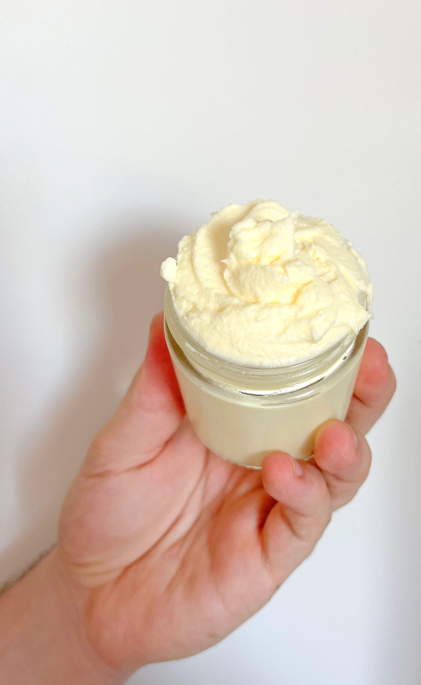 Glass jar of organic whipped tallow moisturizer, perfect for eczema and sensitive skin, grass-fed, Non-GMO, Chemical & Fragrance-Free, deeply nourishing and hydrating"